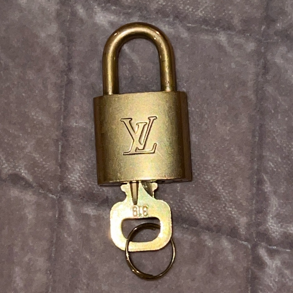 Louis Vuitton Gold tone lock and key #319